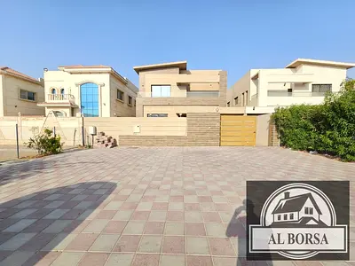 🏡 Villa for rent in Al Rawda - Ajman, 5 master bedrooms + living room + majlis + luxury kitchen + maid's room, ready to move in immediately.