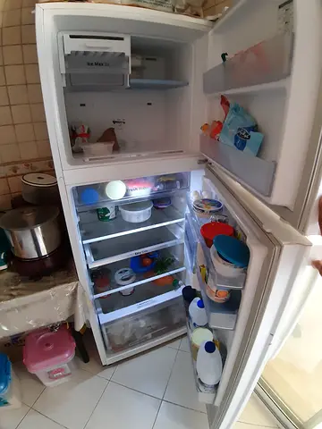 White Double-Door Refrigerator with Freezer - Good Working Condition