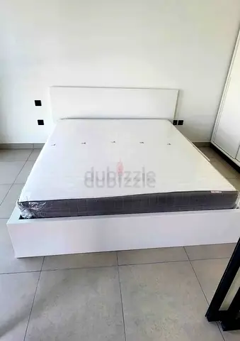 Ikea king size bed with mattress and storage drawers