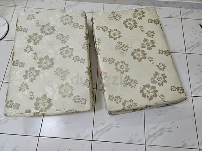 Two single foam mattresses with floral cover - used rarely