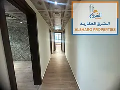 Al Khor Towers – Spacious unit featuring a master bedroom, maid's room, and 4 bathrooms; parquet f