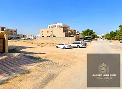 Residential and commercial land (G+1) in a prime location in Al Muwayhat 2, freehold ownership for e
