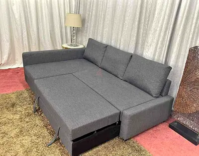 Gray L-shaped Sofa Bed with Storage - Good Condition