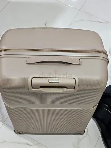 Beige hard-shell roller suitcase - good condition brand new