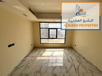 Second-floor apartment – ​​Key-card entry system – Master bedroom – Separate living room – Central air conditioning – Al Jurf 3, Ajman.