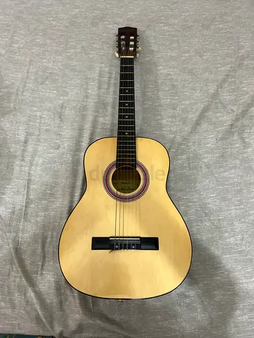 Used Natural Finish Acoustic Guitar - Good Condition