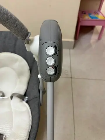 Used Grey Baby Swing with Music and Recline - Good Condition