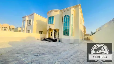 Villa for sale in Al Rawda 1, Ajman. 5 bedrooms, living room, majlis, kitchen, and maid's room.