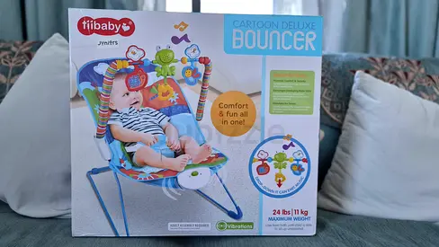 Tiibaby Cartoon Deluxe Baby Bouncer - Good Condition