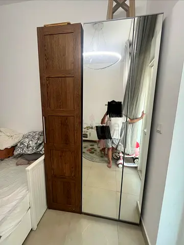 IKEA PAX mirrored wardrobe with oak-style door, 2-door (used)