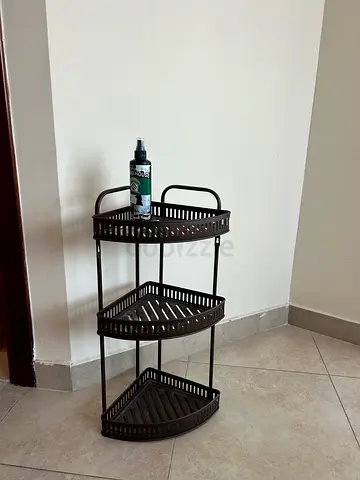 Three-tier metal corner shelf unit - brown/bronze
