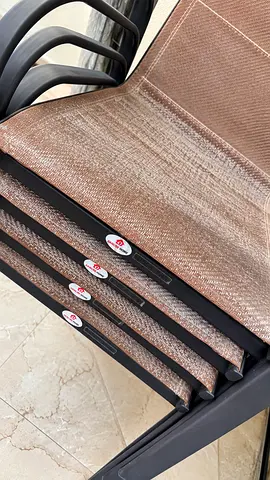Set of 4 Outdoor Stackable Patio Chairs - Brown Mesh, Good Condition from Danube home
