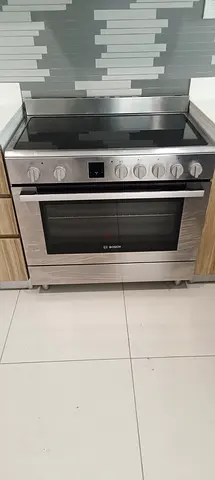 Bosch stainless steel electric range with Electric oven 90cm near new condition .