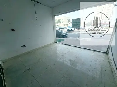 محل للإيجار السنوي في النعيمية 2 – شارع الكويت | 700 قدم مربع | ميزانين | 35,000 درهم