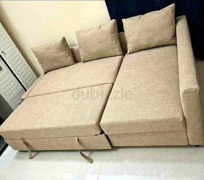 Beige L-shaped Sofa Bed with Storage — Good Condition