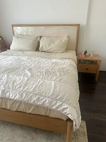 Home Center light oak bed with bedside tables