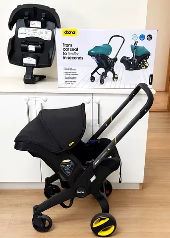 Doona plus travel stroller system with isofix base
