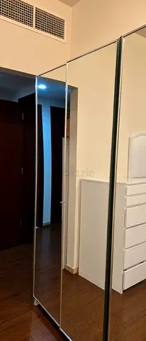 2 Full-length mirrored wardrobe. All shelves inside. AED 300 each.