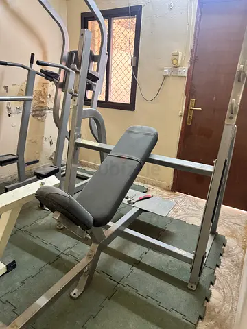 Used multi-station home gym / weight bench - sturdy frame, good condition