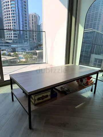 Modern rectangular coffee table with lower shelf - light wood and black metal frame
