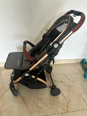 Lightweight single baby stroller with storage basket - good condition