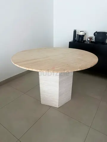 Round traventine dining table