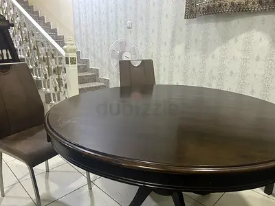 Wooden table with 6 chairs