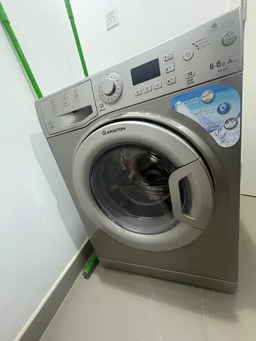 Silver front-load Ariston washing machine and Dryer - 8kg, Eco- Tech