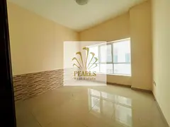 Two-bedroom apartment with a living room in Al Rashidiya 1 (Pearl Towers) featuring 2 bathrooms a ba