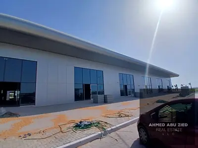 A warehouse suitable for various business activities, including service centers, car washes, garage