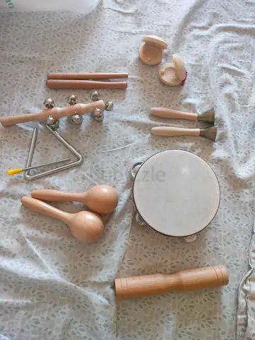 Mixed percussion accessories set — tambourine, maracas, bells, triangle and more