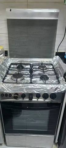 Stainless Steel 4-Burner Gas Cooker with Oven - Good Working Condition