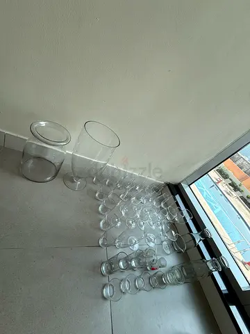 Assorted clear glass jars and bottles - bulk set