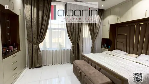 Luxurious, fully furnished villa for sale in Al-Yasmeen, featuring high-end finishes.