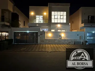 Villa for sale in Al-Yasmeen featuring 5 master bedrooms, a majlis, a living area, a kitchen, and a maid's room; includes water, electricity, and air