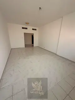 Two bedroom apartment with living room for annual rent in Al Qasimia Al Soor featuring two bathrooms