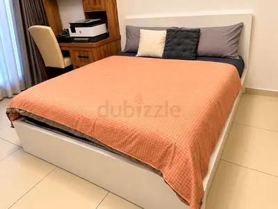 Selling an IKEA MALM Ottoman Double Bed in White(without mattress) with hydraulic lift-up storage an