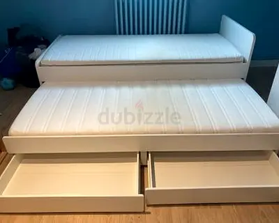 White trundle bed with two storage drawers - single beds set
