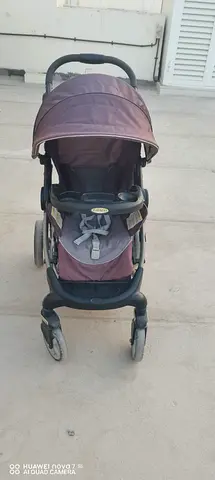 Used single baby stroller with canopy and tray - good condition