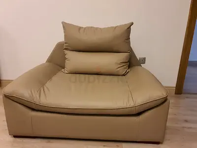 Large beige leather lounge armchair - single seat, good condition