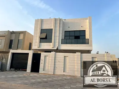 🏡 For sale: Villa in Al Bahia – Ajman, 5 bedrooms + Majlis + Hall + Maid's room, including electricity, water and registration fees.
