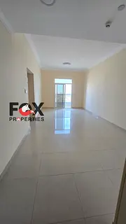 Two-bedroom apartment with a living room for rent in Al Jurf 3 | 2 bathrooms, balcony, and built-in