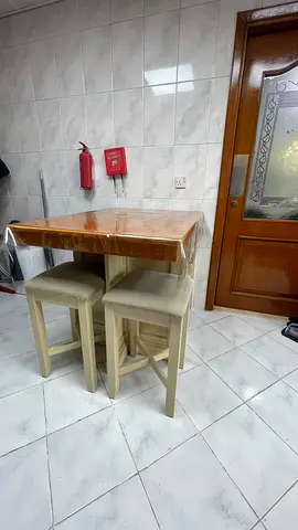 Compact wooden bar table with four stools - good condition