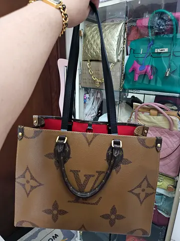 Authentic Louis Vuitton MM Microchipped On the Go Tote Bag