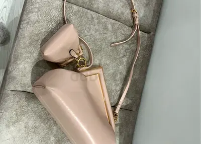 Copy a Light pink leather crossbody bag with matching coin pouch