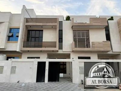 For rent in Al Yasmeen, Ajman: a townhouse featuring 5 master bedrooms, a majlis, and a living area, distributed across the ground floor, first floor,