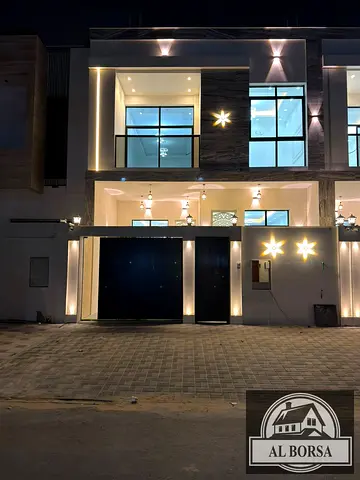 Townhouse for rent in Al Yasmin, Ajman: 5 master bedrooms, living room, majlis, spacious kitchen, and roof terrace.