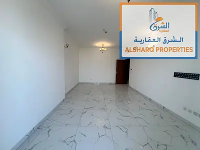 شقة غرفتين وصالة للإيجار السنوي في أبراج الواحة، الراشدية 1، شارع الميناء، عجمان، تتميز بإطلالة بحرية جميلة وموقع مميز بالقرب من مختلف الخدمات والمراف
