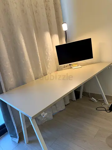 Minimal white study desk with built-in modesty panel