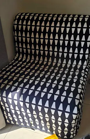 IKEA Lycksele Chair / folds into a single bed with black and white cover